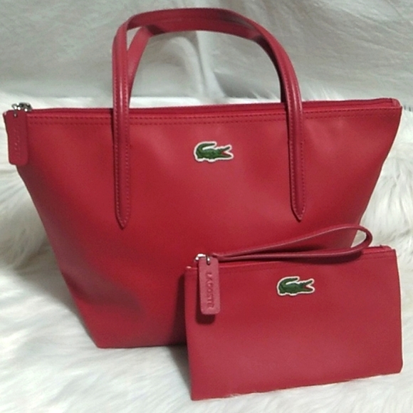 Lacoste Handbags - FINAL SALE! NWOT Lacoste Bag W/Matching Wristlet Never Used